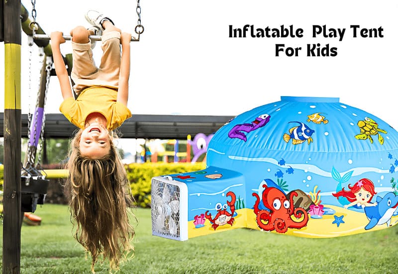 Underwater themed Inflatable play tent and a child on the swing