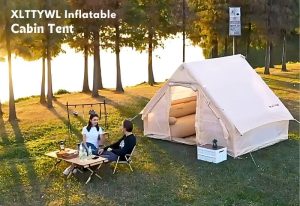 Couple enjoying a day at a woodland near water with their XLTTYWL Inflatable Cabin Tent