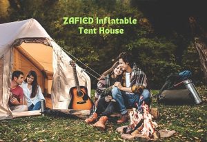 Couples enjoying campfire while camping out with a ZAFIED Inflatable Tent House