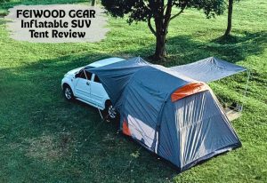 Full view of the FEIWOOD GEAR Inflatable SUV Tent rigged with the awning